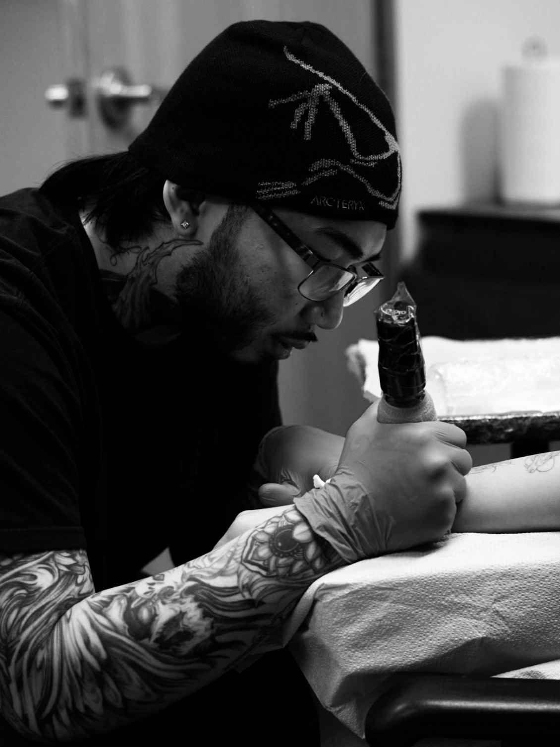 Billy tattooing a forearm